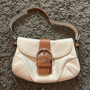 Vintage White Coach small handbag with brown shoulder strap, magnet front buckle
